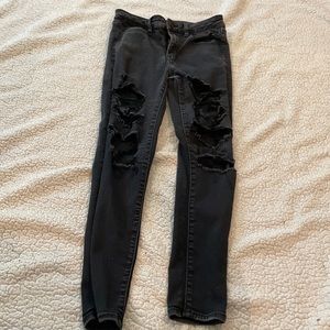 Black denim, distressed skinny jeans.